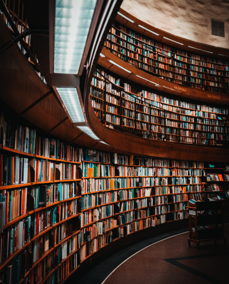 A huge hall with bookshelves to the ceiling
